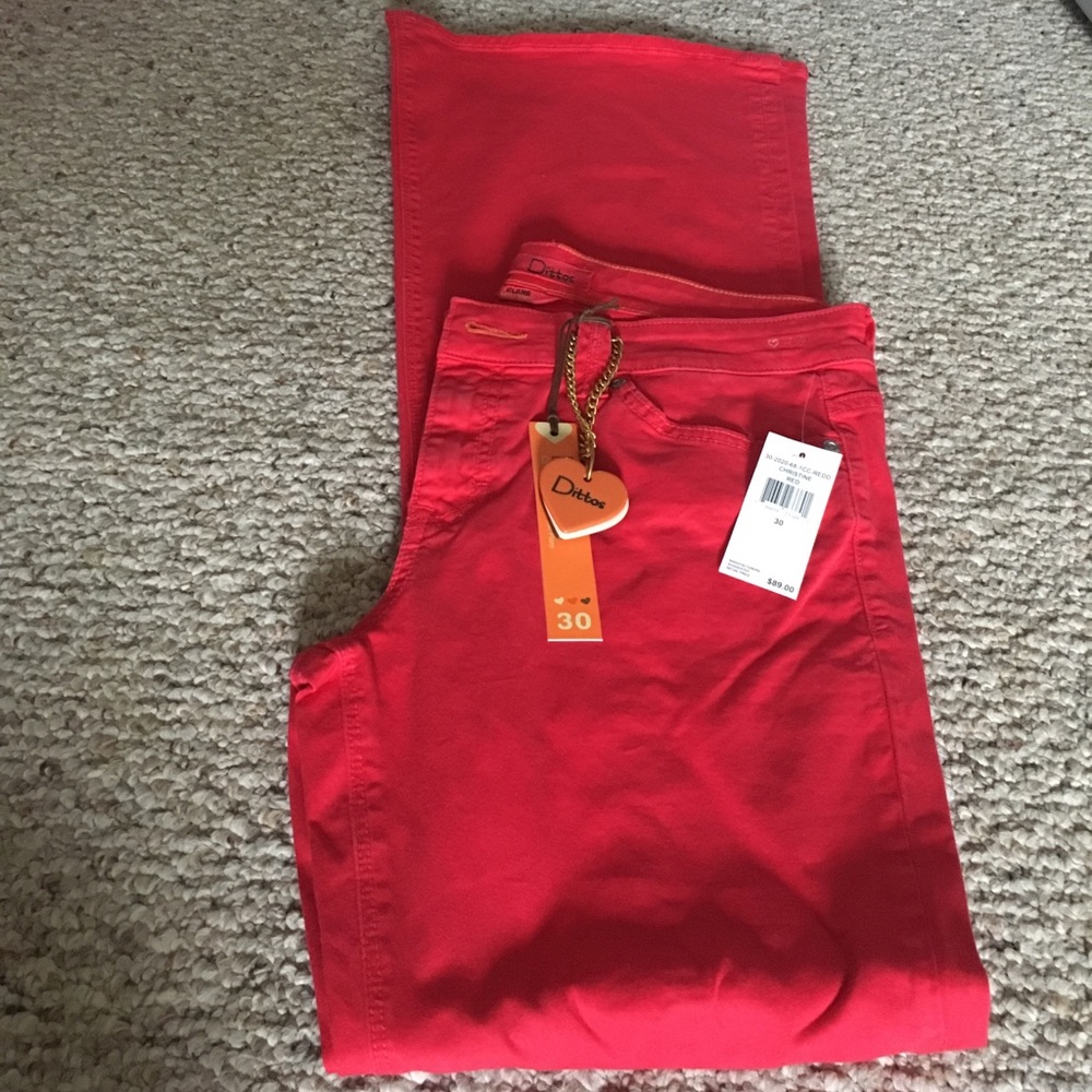 Red mid-rise bell bottom jeans