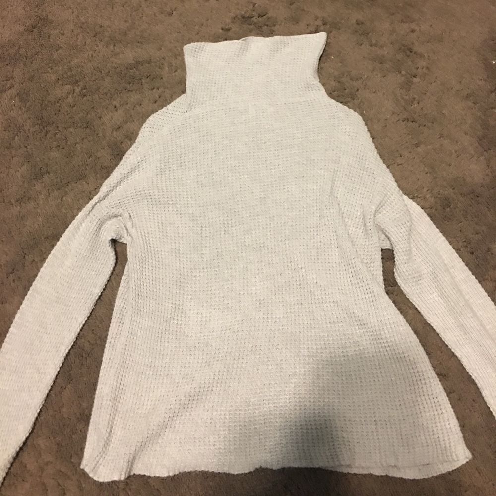 White turtleneck sweater