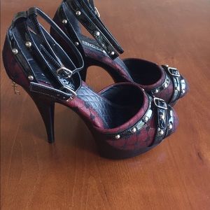 Studded red with black heart platform heels