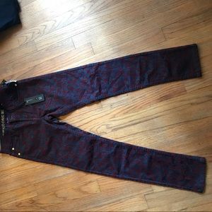 Black and red swirl dark denim pants