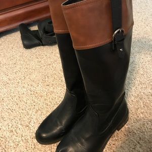 Black and brown riding boots