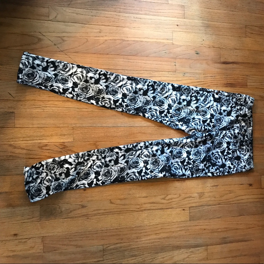 Black jean with white rose imprinted