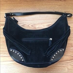 MUST GO Black leather handbag with tassels