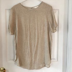 Silk blouse with a polka dot pattern