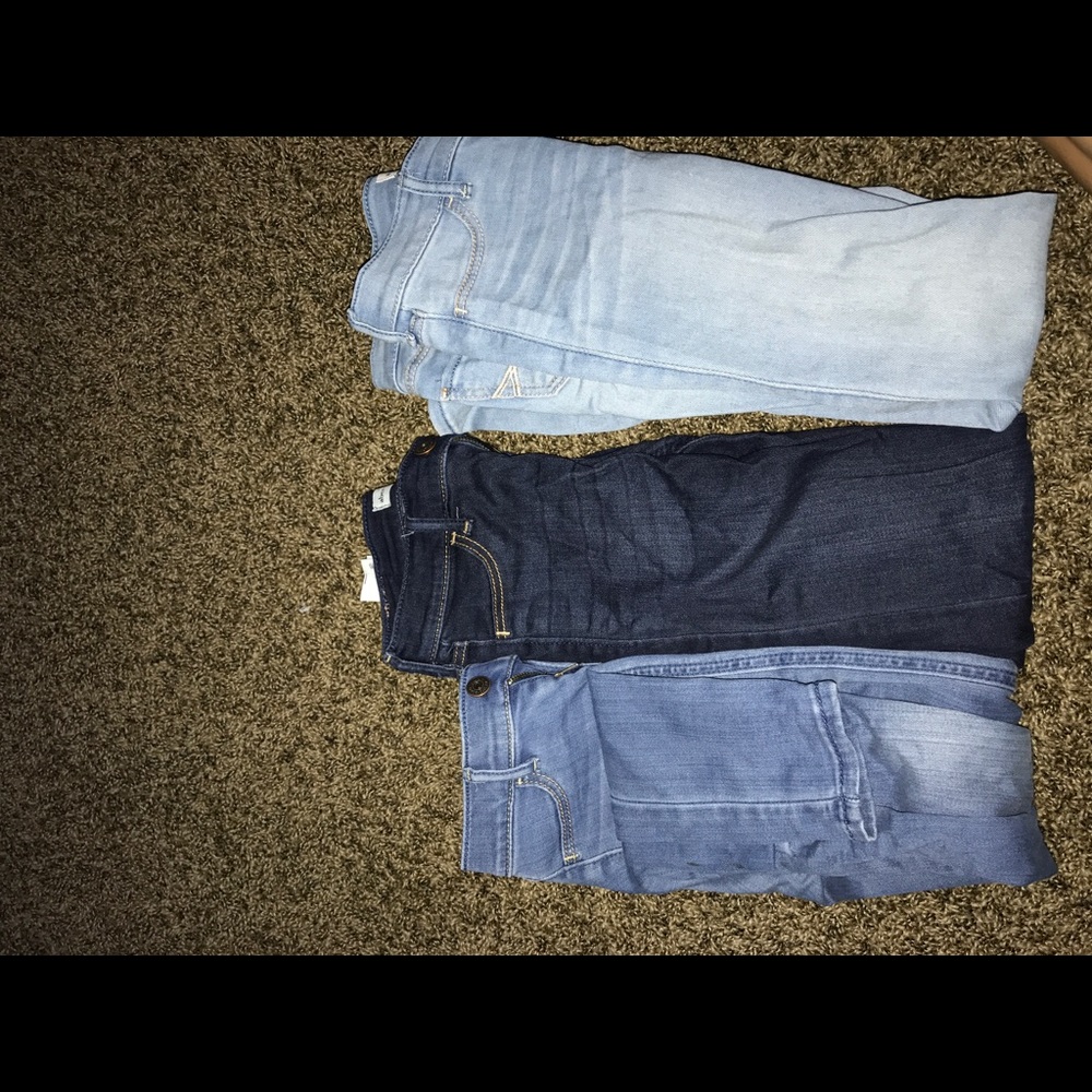Three Abercrombie kids size 12 bluejeans.