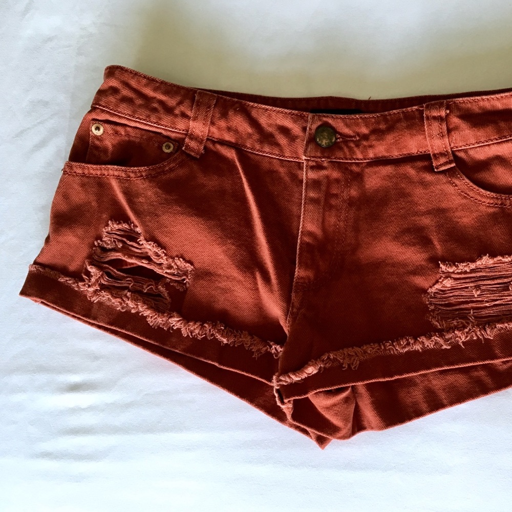 Ripped Red Denim Shorts