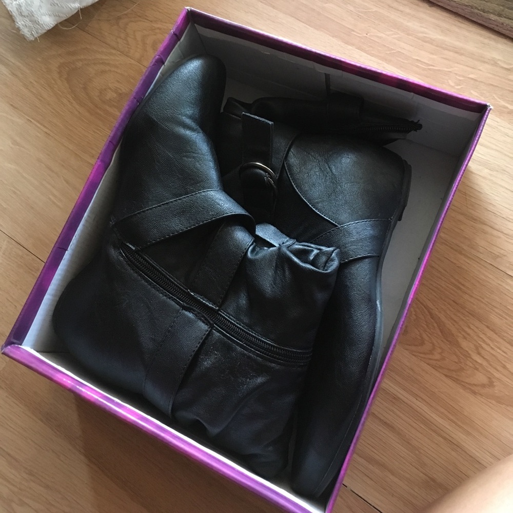 Mid-calf black leather boots