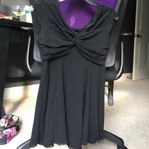 Black tank crisscrossed Bryant