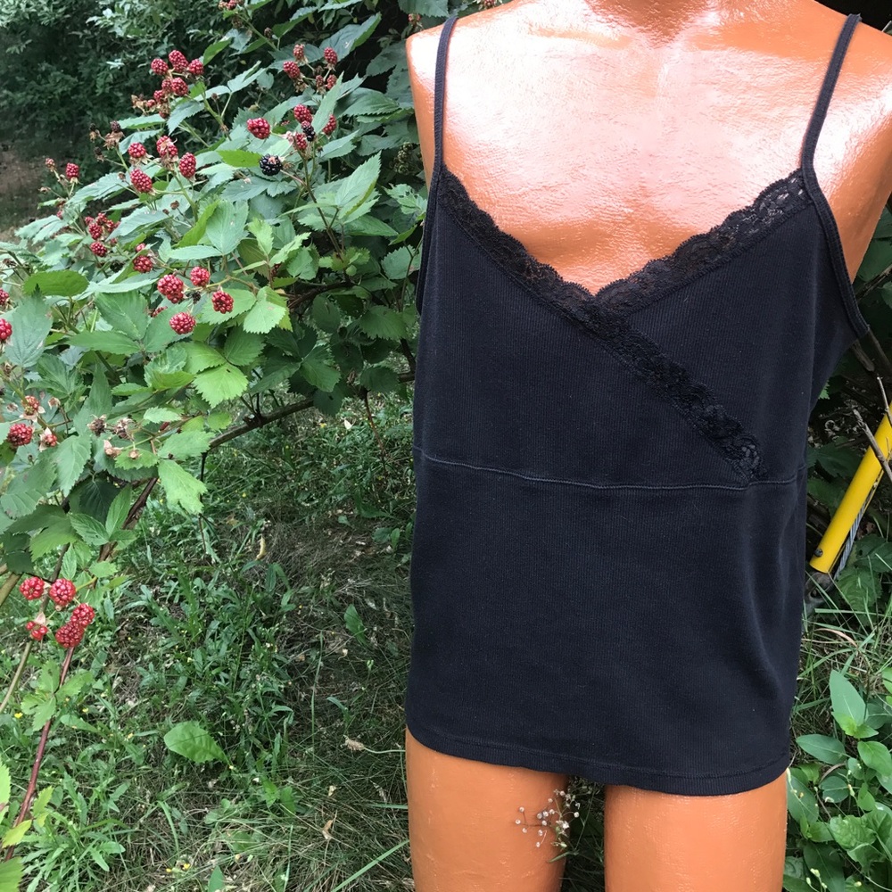 Lace cross front top with spaghetti straps.
