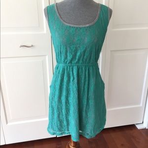 Vanity green lace dress with pockets
