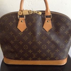 AUTHENTIC Louis Vuitton ALMA handbag