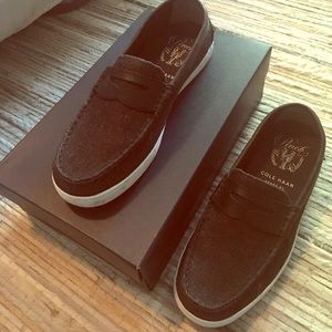 Barely worn Coke Haan slip ons in black canvas