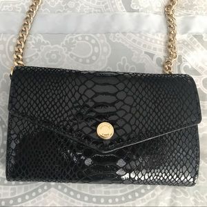 Michael Kors clutch wallet with removable handles