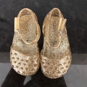 Gold glitter jelly shoes