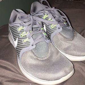 Grey Nike free running shoes