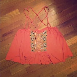 Flowy crop top with a cool design on the back