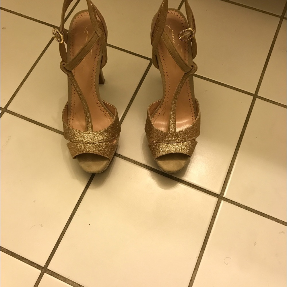 Gently used platform heels with original box.