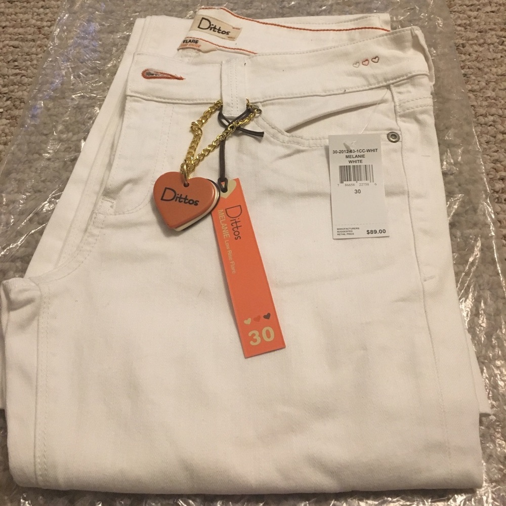 White jeans. Mid rise flare.