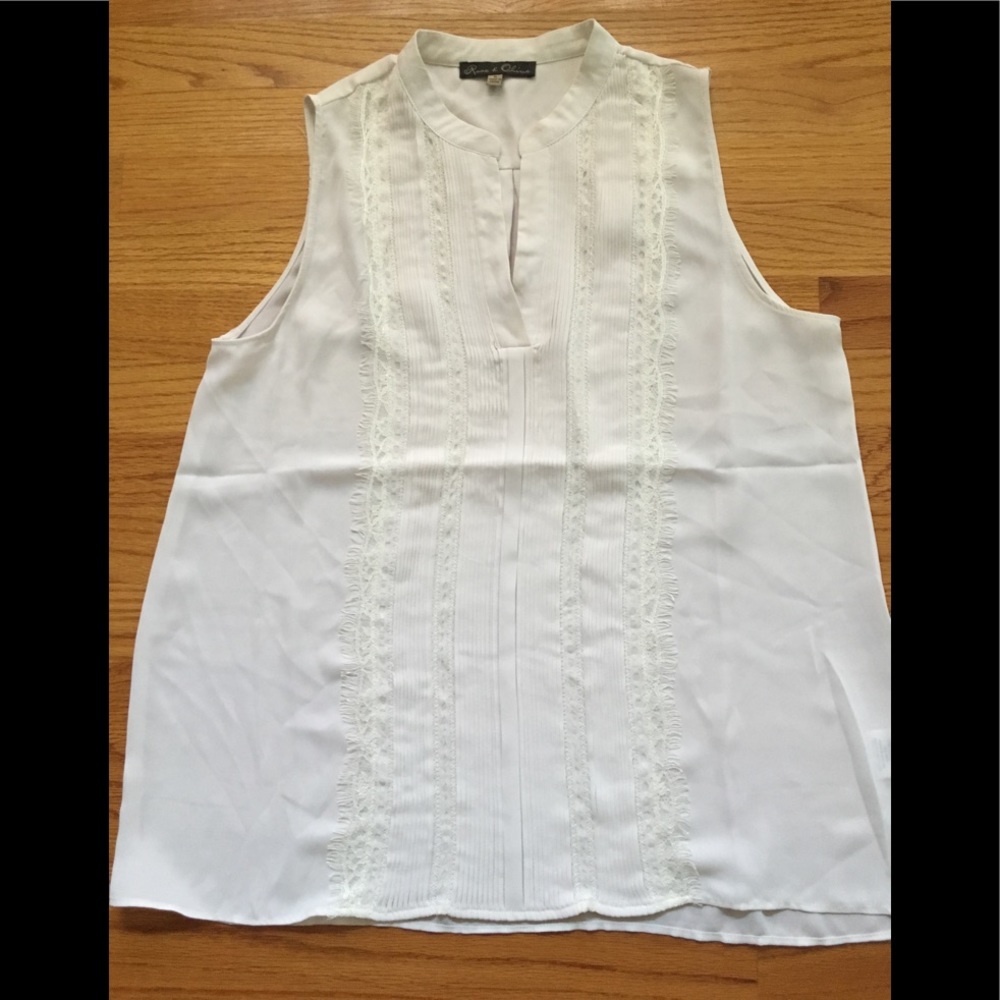 White sleeveless top