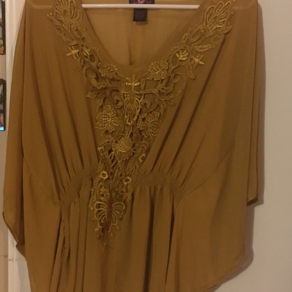 Sheer silky poncho style with cinched waist