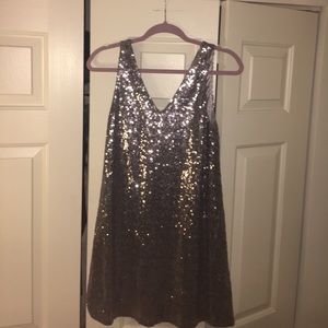 Silver sequin, bow back shift dress.