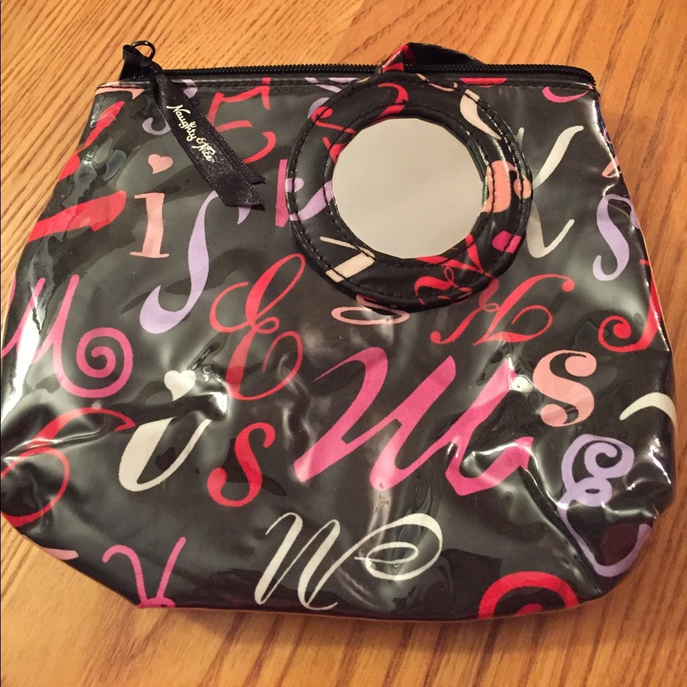 Cosmetic bag w attached mirror