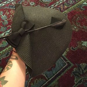 Black woven tilt hat