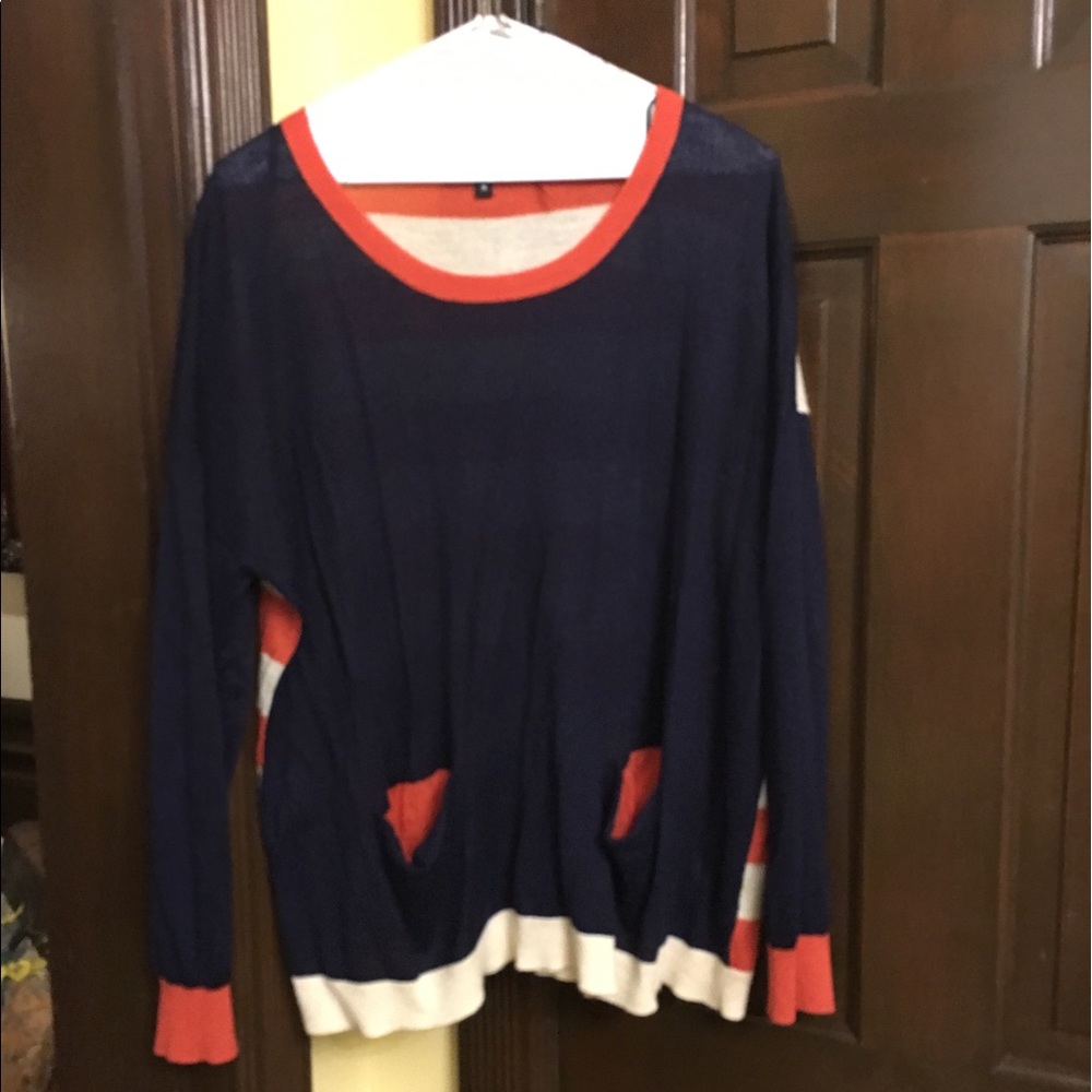 Very light sweater top.