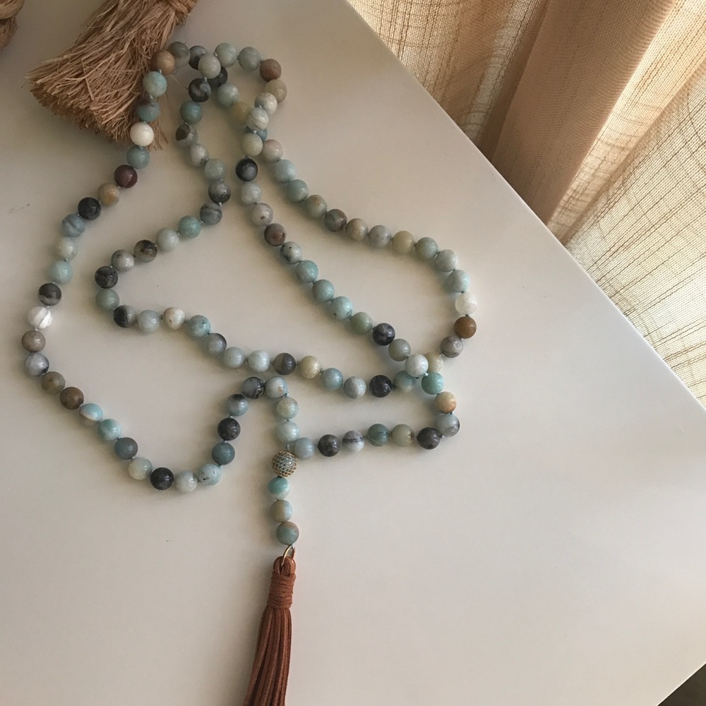 Beautiful beaded necklace with Suede tassel