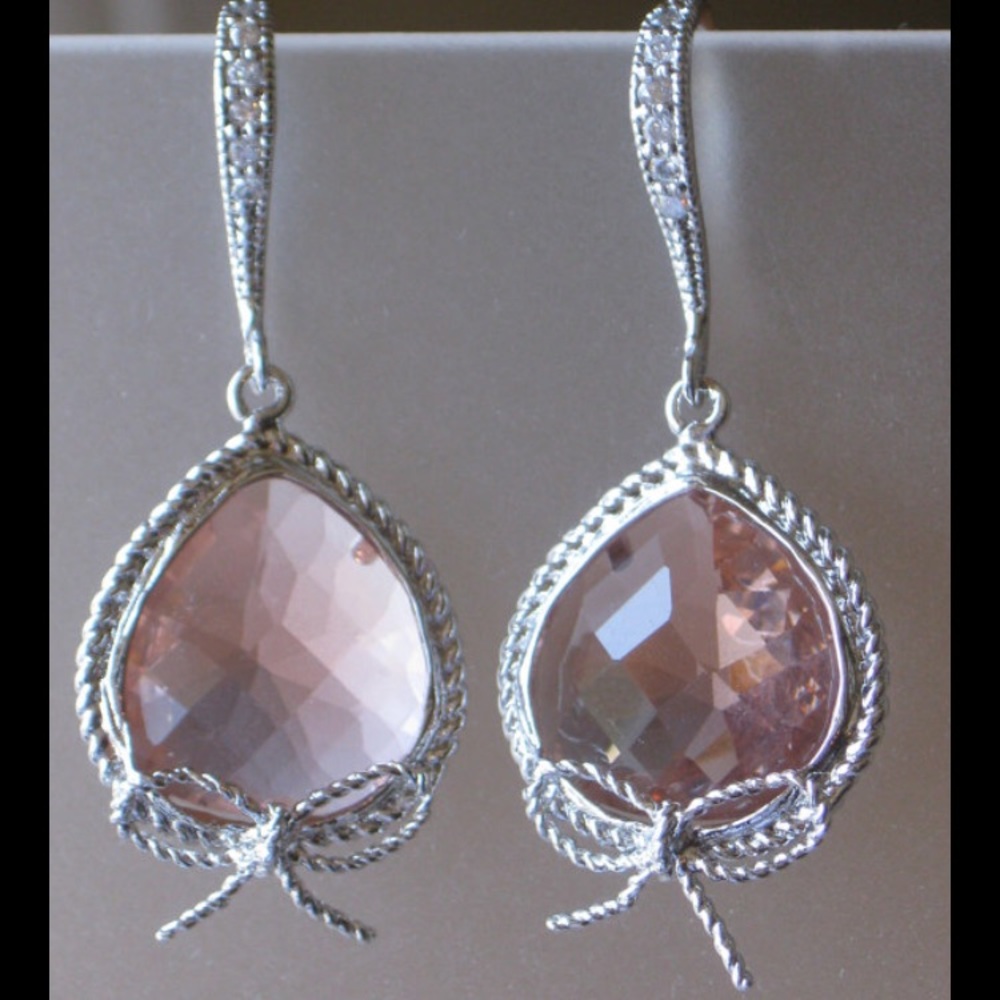 Bow detail silver peach glass pave earrings