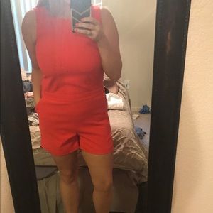 Fun flirty orange romper great with leopard heels