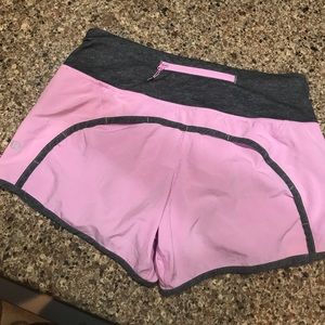 Pink lululemon running shorts