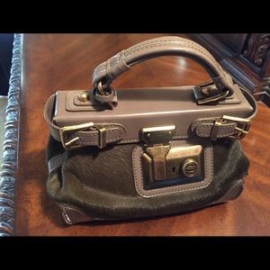Tod's purse. Fur and leather
