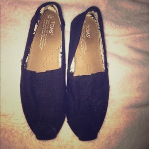 Black toms with white sole