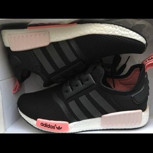 Black and pink adidas NMDs