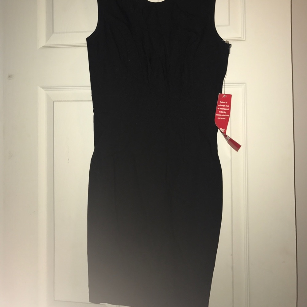 Black knee length dress with open lace back