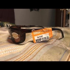 Real Costa sunglasses, they're unisex