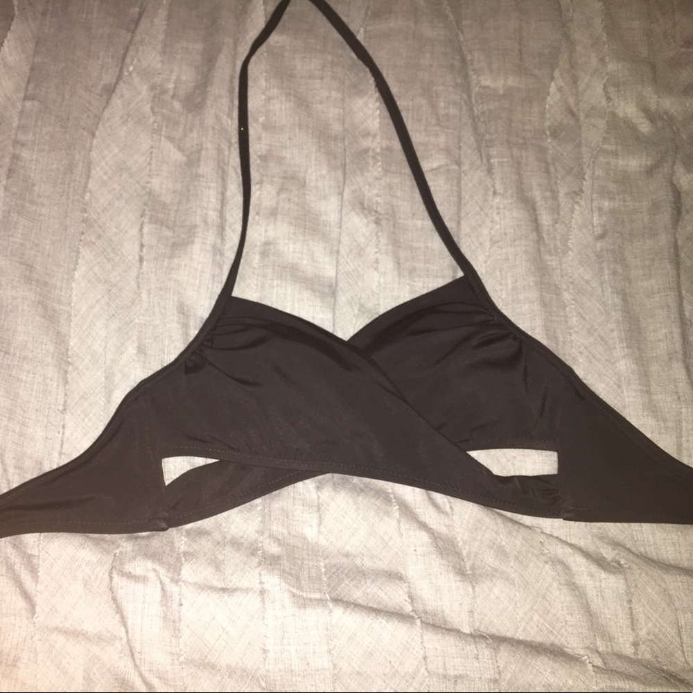 crossed bathing suit top