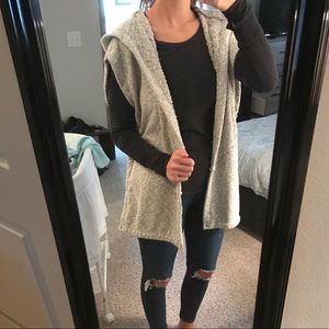 Oversized, hooded sweater vest