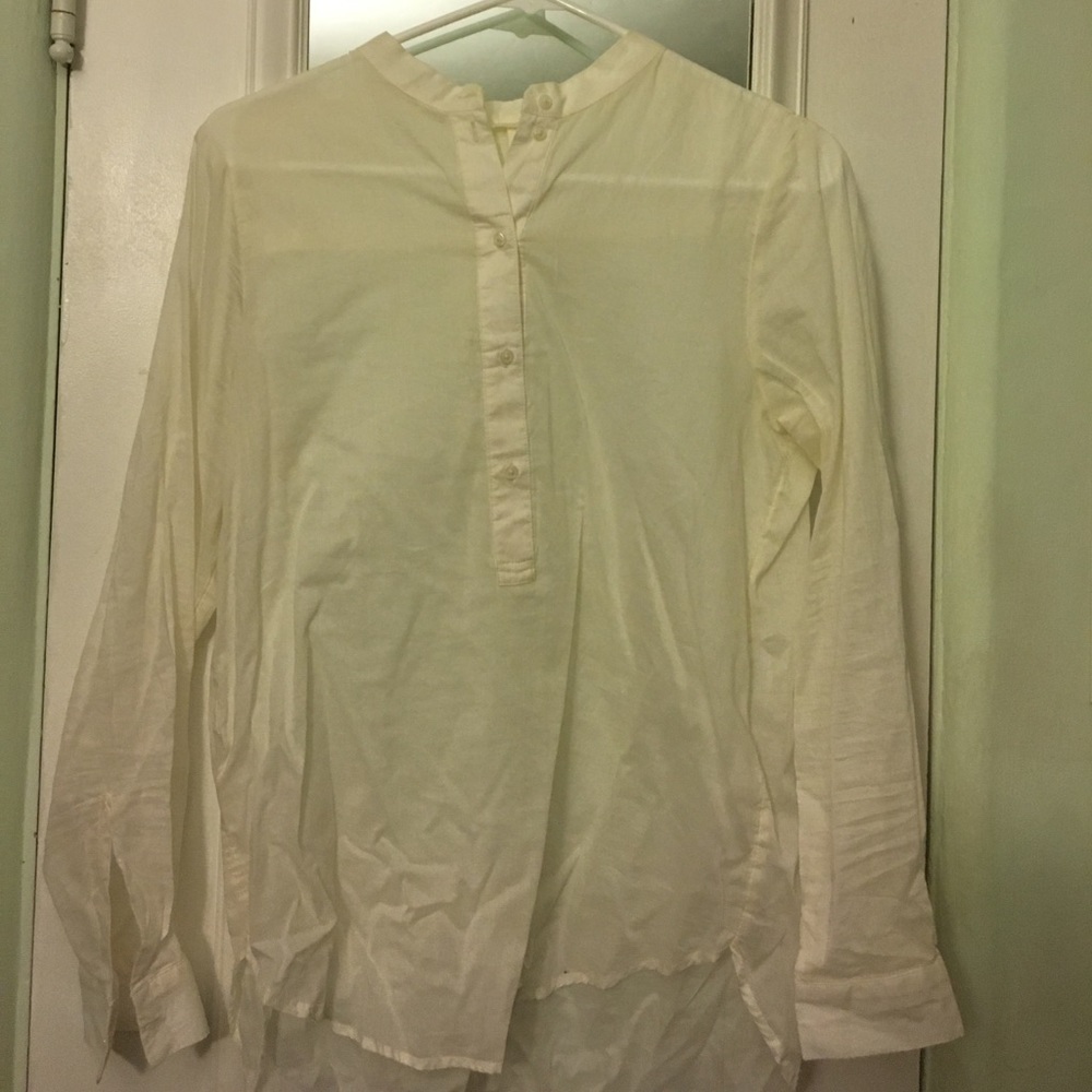 White collarless blouse