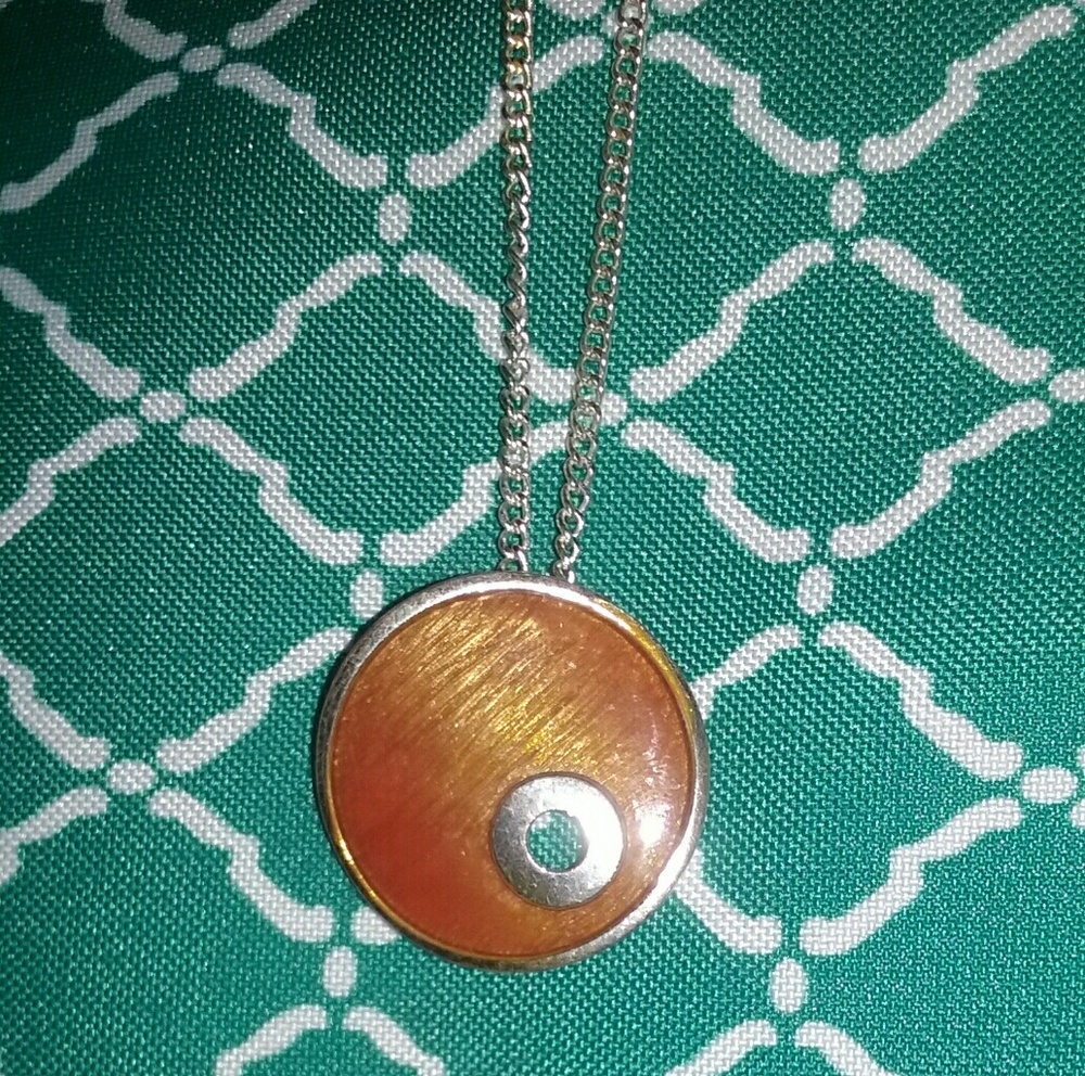 Amber pendant on silver tone necklace.  NWT