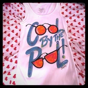 It's a tank top is said cool by the pool