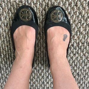 Black patent leather Caroline flats.