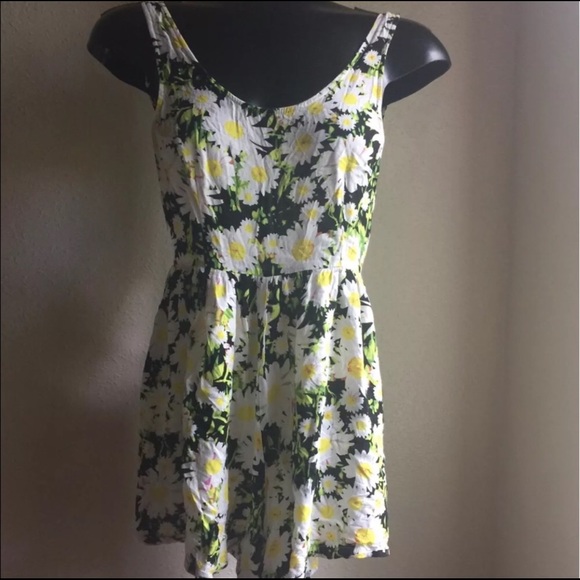 8 Birdies Dresses & Skirts - Black Sunflower Printed Romper w a Low Back