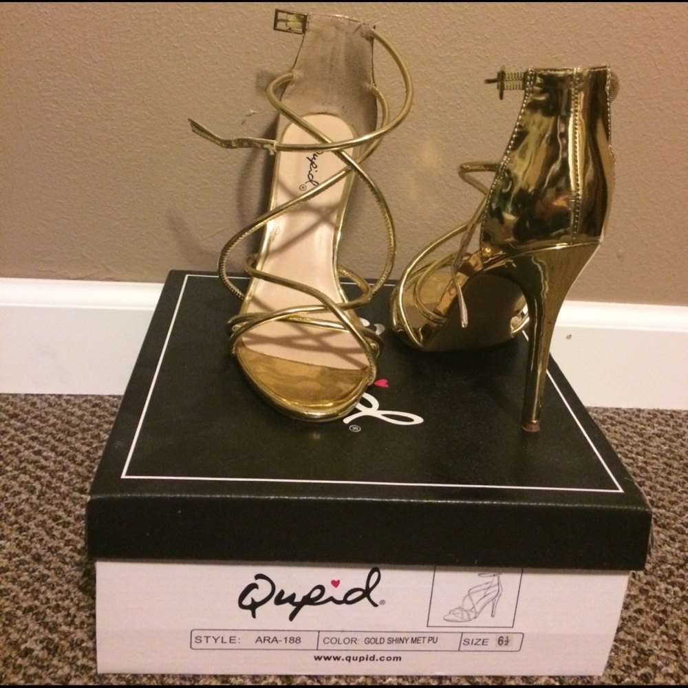A pair of gold heels