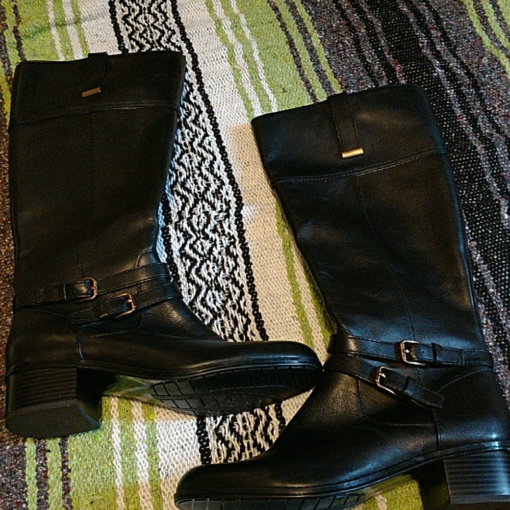 Black below the knee boots
