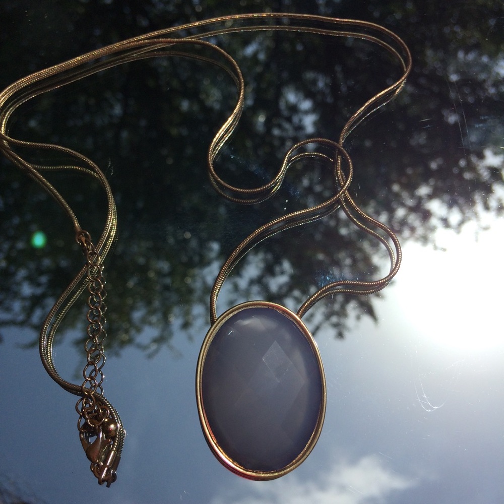 Gold long necklace with big blue oval pendant