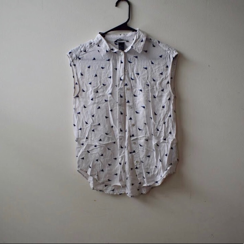 Short sleeve button down blouse.