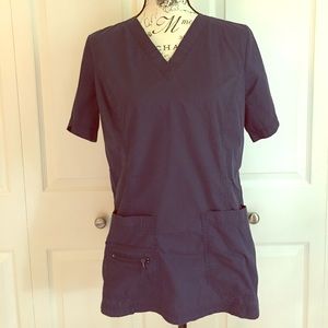 Navy blue scrub pants with matching scrub top.