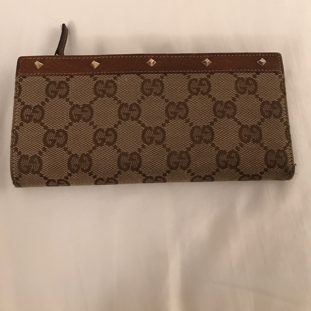 Gucci wallet with gold studs